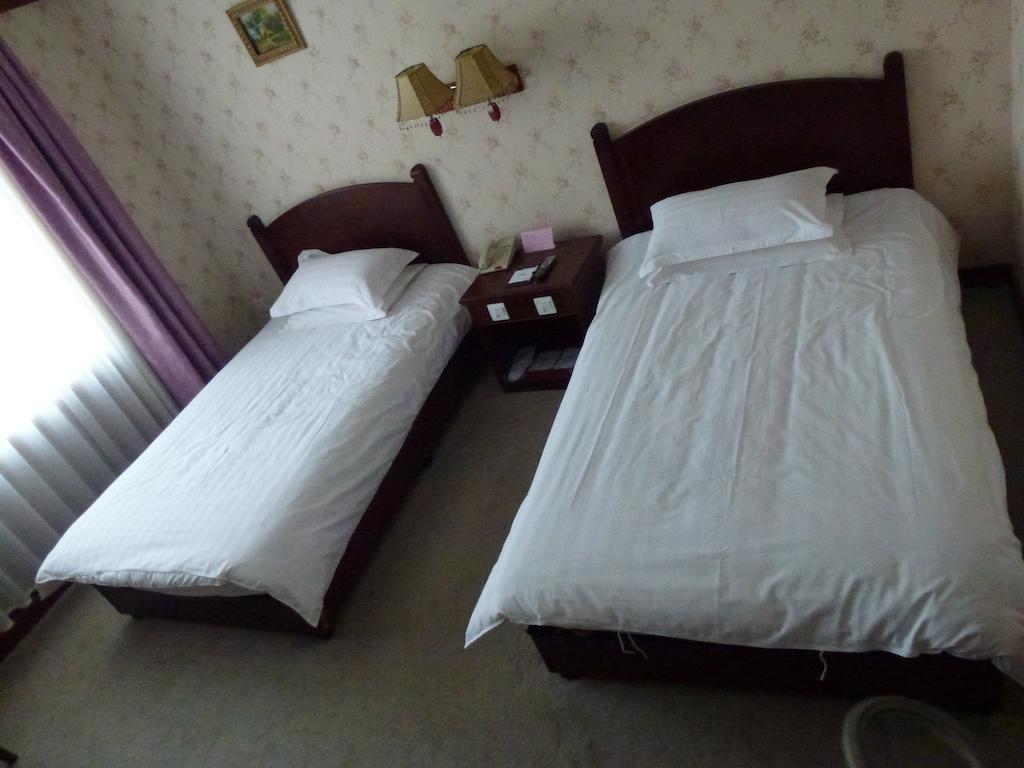 Hotel Harbin Volgamanor Acheng Zimmer foto