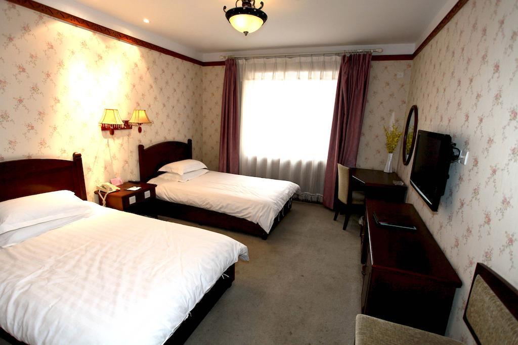 Hotel Harbin Volgamanor Acheng Zimmer foto